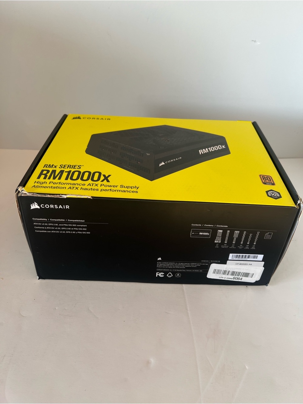 Corsair RM1000x Power Supply - Black on Yellow Packaging